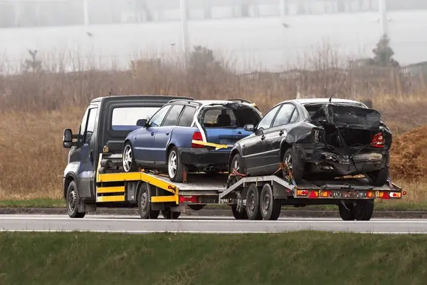 Vehicle on flatbed tow truck